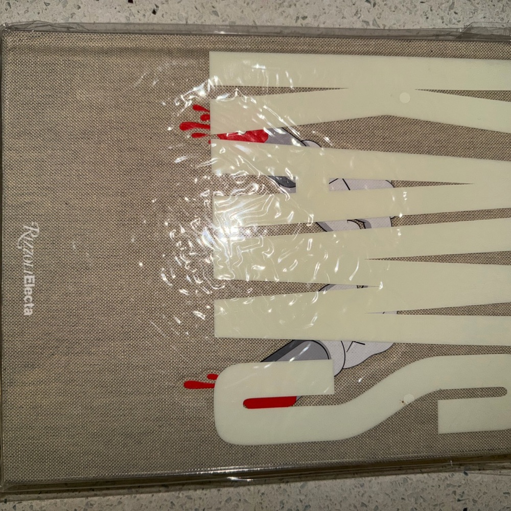KAWS Beige and Red Art Book‎